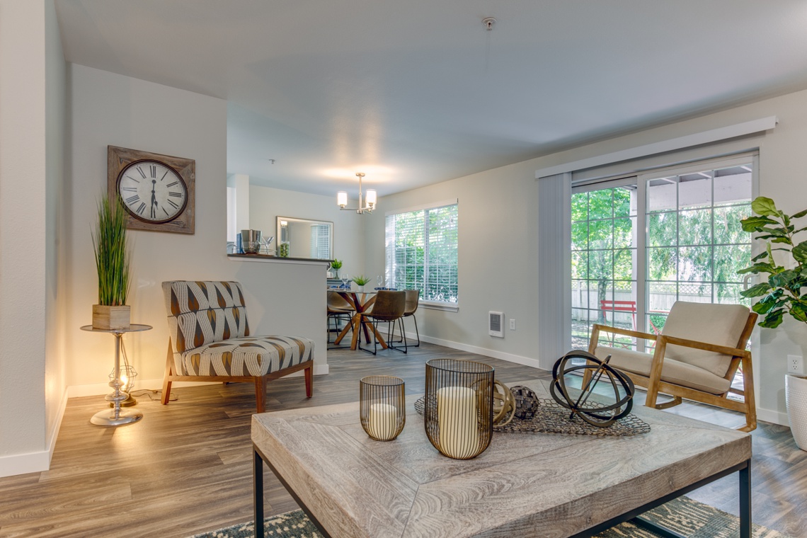 Apartment unit living room with large coffee table and seating