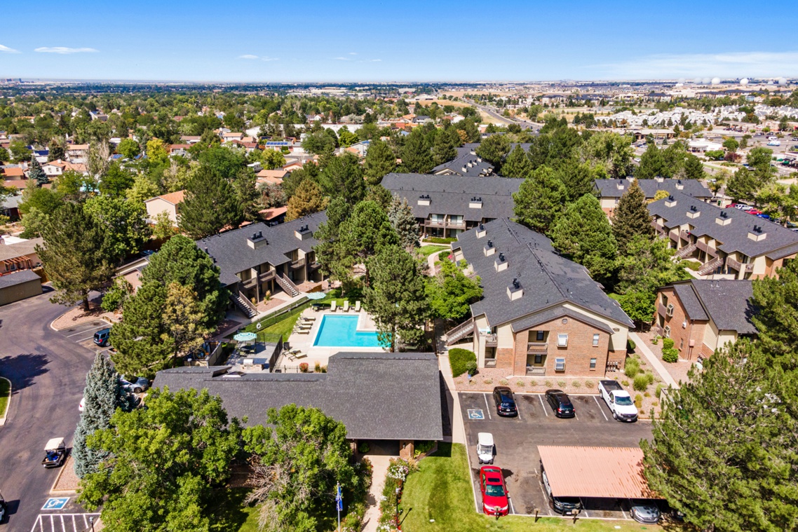 Drone shot looking down on Shift apartments and an outdoor pool area.